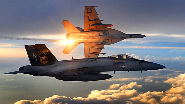 https://upload.wikimedia.org/wikipedia/commons/9/9b/FA-18_Super_Hornets_of_Strike_Fighter_Squadron_31_fly_patrol%2C_Afghanistan%2C_December_15%2C_2008.jpg