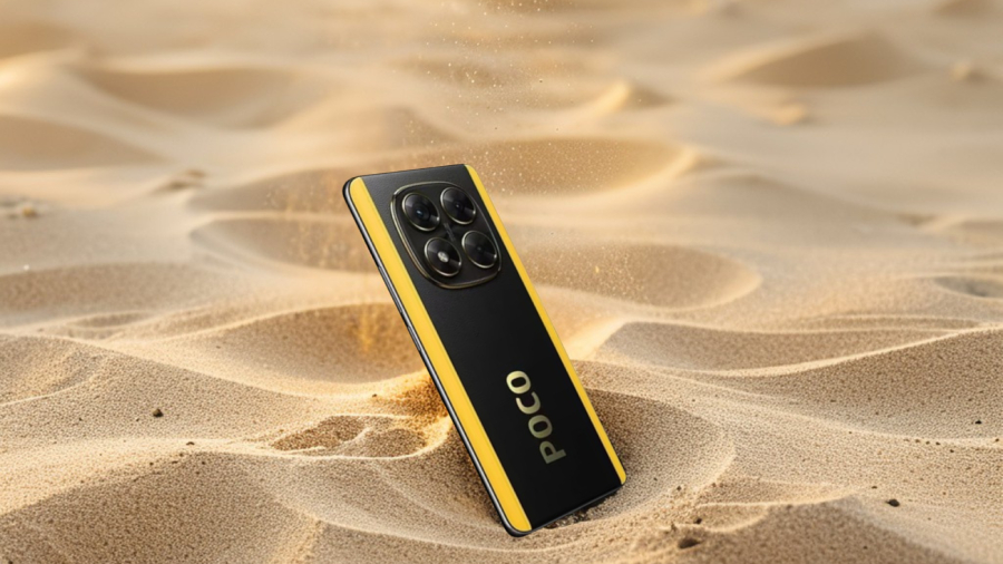 POCO X7 v černo-žluté barvě hozený v písku