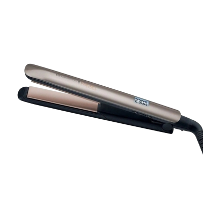 Žehlička na vlasy Remington S8540 v hnědé barvě.