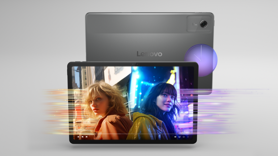 Tablet Lenovo Idea Tab 11" leží na zádech, zatímco druhý tablet s aktivním displejem ukazuje filmový záběr dvou žen.
