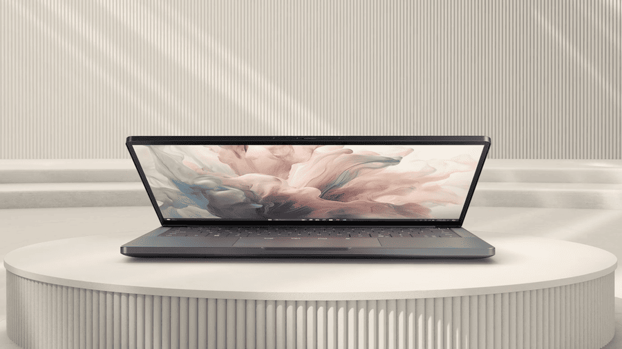 Notebook Dell Pro 13 Premium položený na kulaté podstavě.