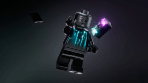 LEGO Smart Brick panáček a kostka na černém pozadí.