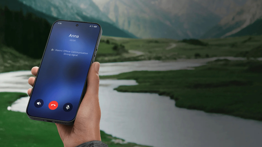 Chytrý telefon Xiaomi 17 Ultra držený v ruce ukazuje probíhající hovor přes funkci Xiaomi Offline Communication se silným signálem uprostřed horské krajiny.