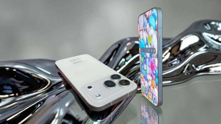 Zlatobílý chytrý telefon HONOR 600 Pro leží na lesklém perleťovém podkladu vedle stojícího displeje s tenkými rámečky.