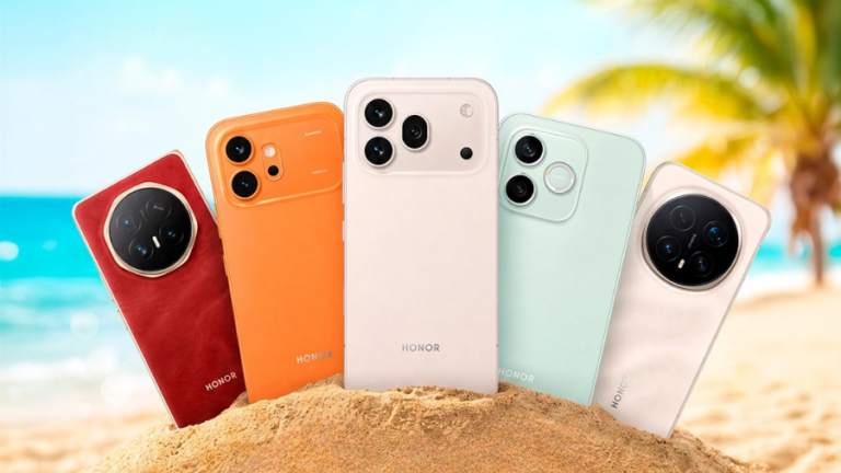 Pět různých mobilních telefonů značky HONOR v písku